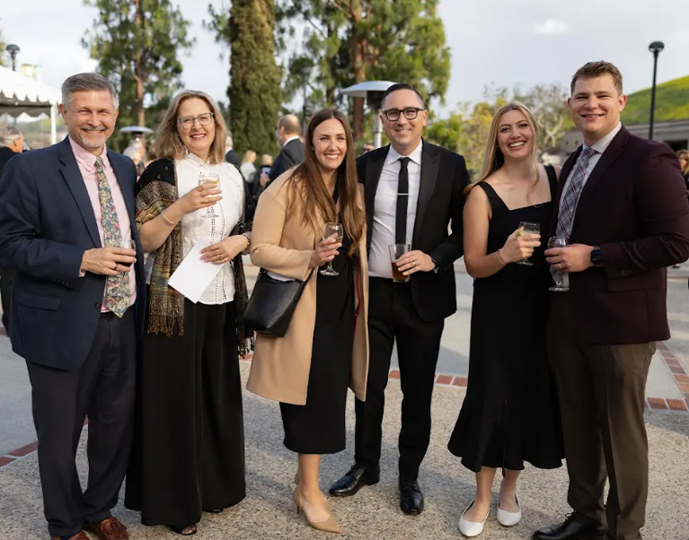 Guests enjoying the outdoor reception at the Gala